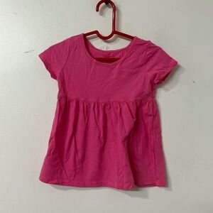 The children place shirt